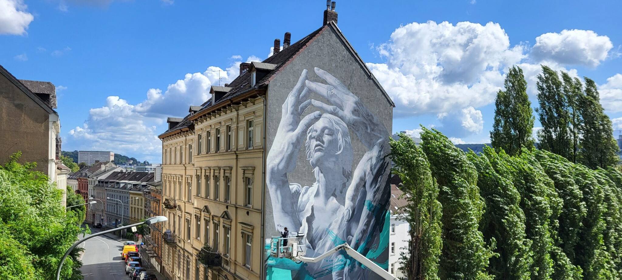 Fahrradclub radelt zu Wandgemälden